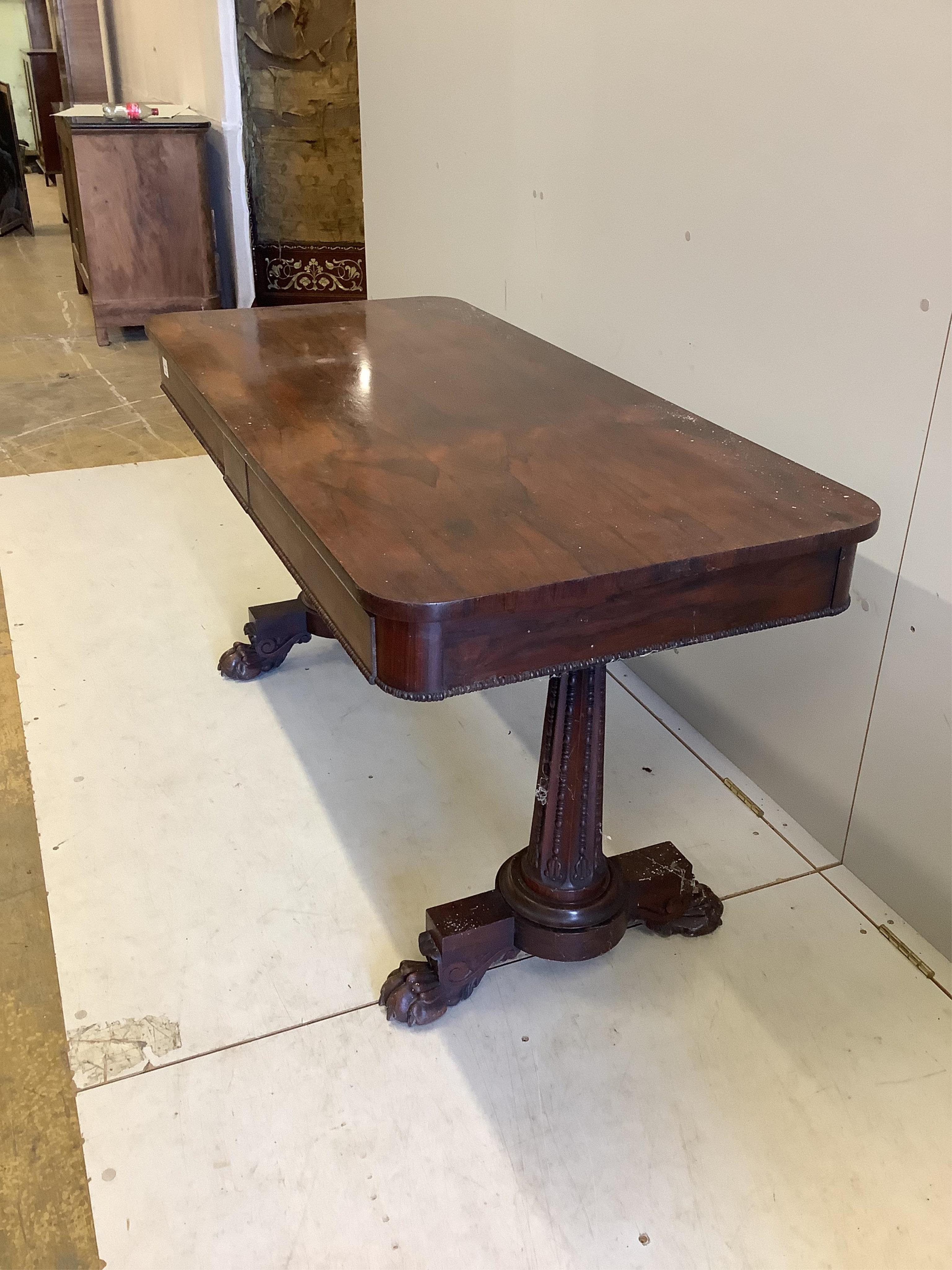 An early Victorian rosewood centre table, width 137cm, depth 64cm, height 72cm. Condition - fair